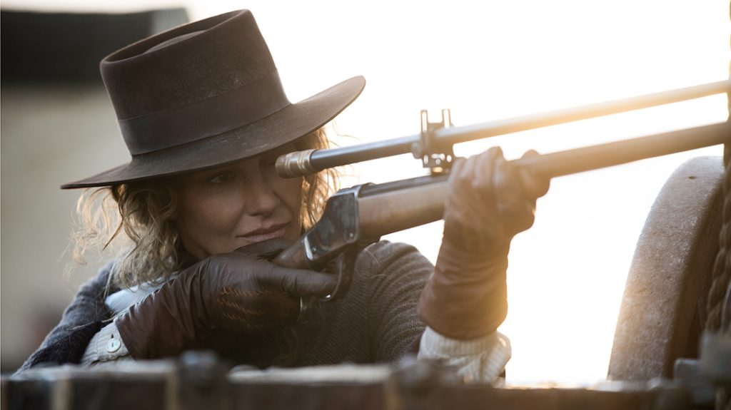 Margaret Dutton (Faith Hill) is seen holding the anachronistic Winchester Model 1885 High Wall&mdash;fitted with a Hi-Lux Optics Malcolm 6X, 30-inch-long telescopic rifle sight.