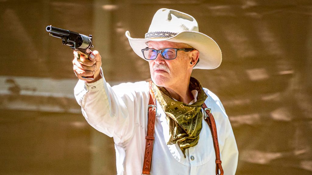 At the Cowboy Town range, LaVista Bill shot steel targets with the Cimarron Lonesome Dove Walker Colt; hits were not difficult at distances from 5 to 25 yards.