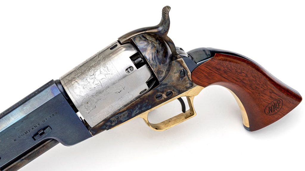Both Walker Colt cylinders are left &ldquo;in the white&rdquo; and have the engraved &ldquo;dragoon and Indian&rdquo; scene. The walnut stocks have an inspector&rsquo;s cartouche stamped on them.