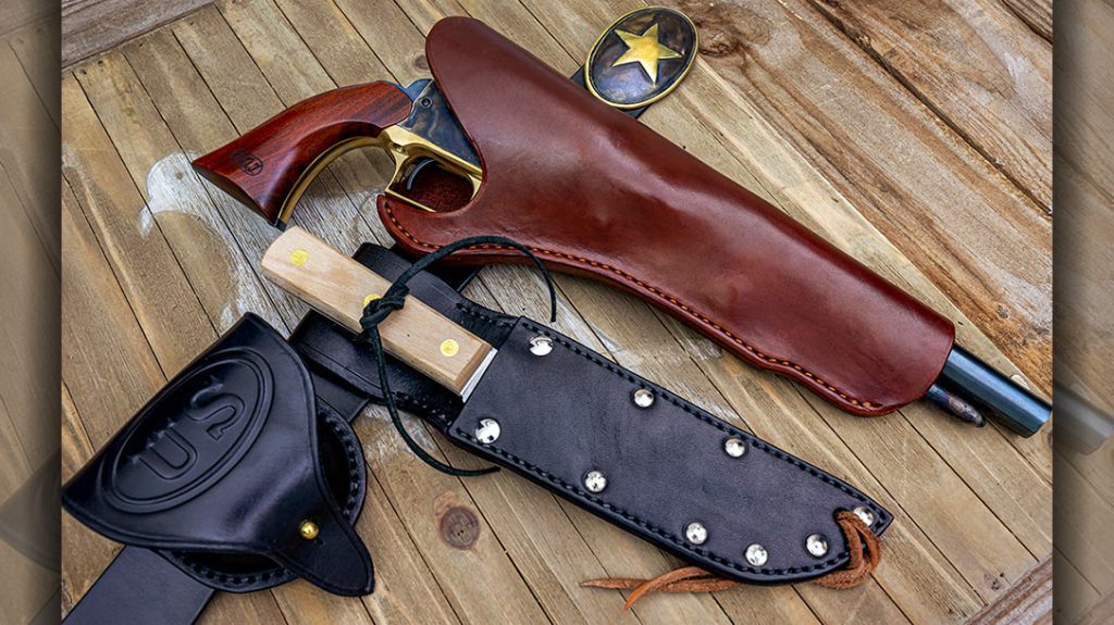 Shown is the &ldquo;Gus McCrae&rdquo; leather gear from Chisholm&rsquo;s Trail Old West Leather. Included in the set are (left to right) a belt, cap box, knife with sheath, holster and authentic belt buckle.