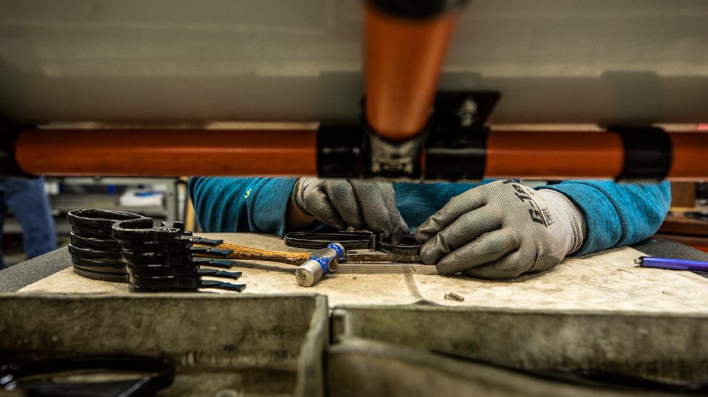 Levers being prepared for rifles at the Henry Repeating Arms factory.
