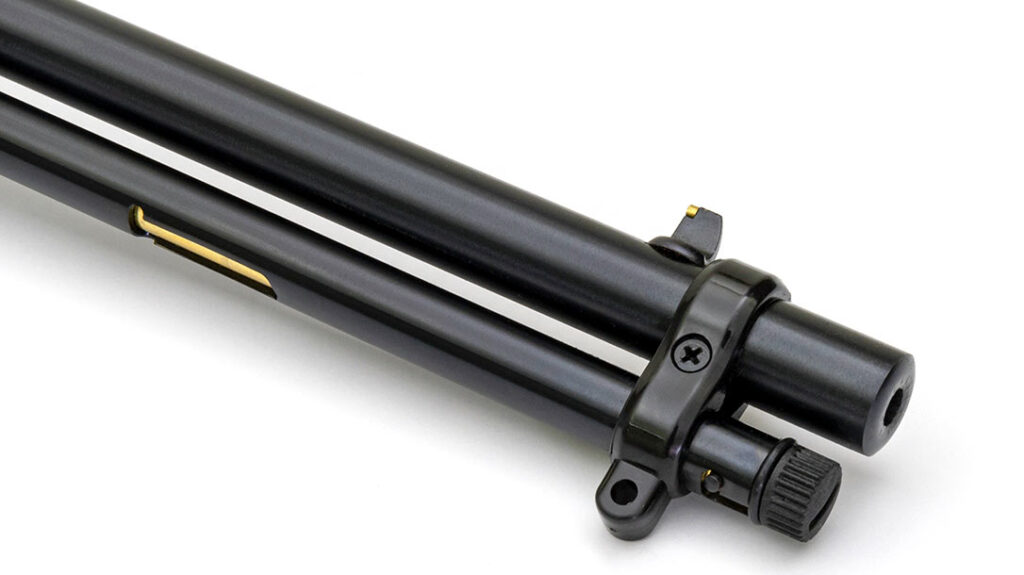 Up front is the post front sight with brass bead and a barrel band with sling swivel stud. Ammunition is fed into the magazine through the port, and the magazine tube has a locking cap just below the muzzle.