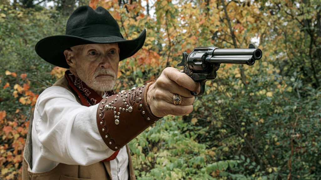 To pack the Model P during a western action shooting match, the author used this Model 1880 cartridge belt and holster rig from Galco.