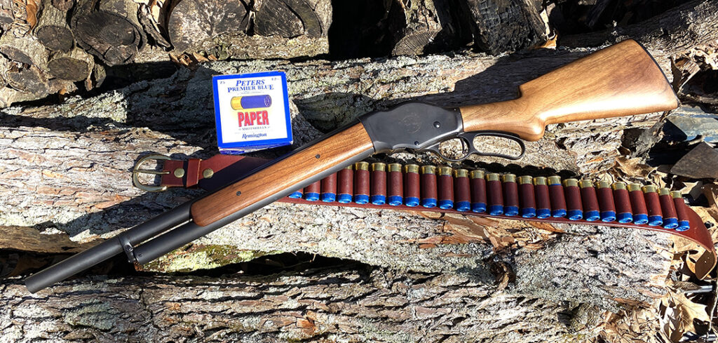 Cimarron 1887 and ammo in belt.