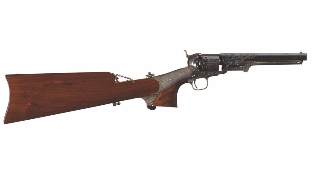 A rarity found among the pistols are the attachable shoulder stocks, as seen on this exquisitely engraved late model Navy.